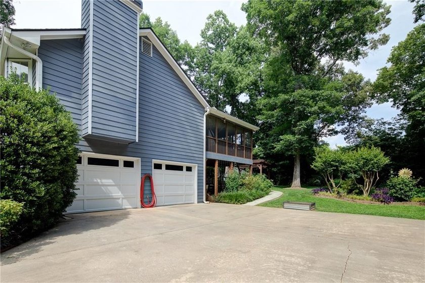 Welcome to #6580 Remington Drive in Cumming, a beautifully - photo 8