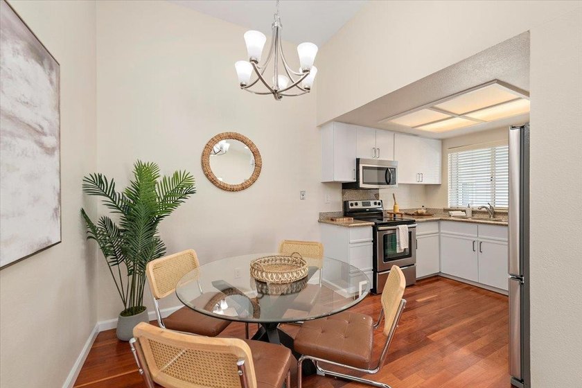 Indulge in the serenity of this beautifully updated top-floor - photo 13