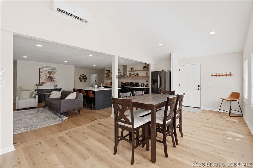 Lakefront living on 2 private acres at the 8MM near Laurie! - photo 5