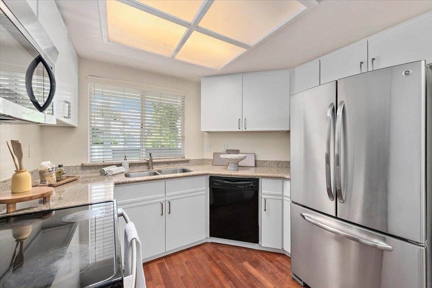 Indulge in the serenity of this beautifully updated top-floor - photo 15