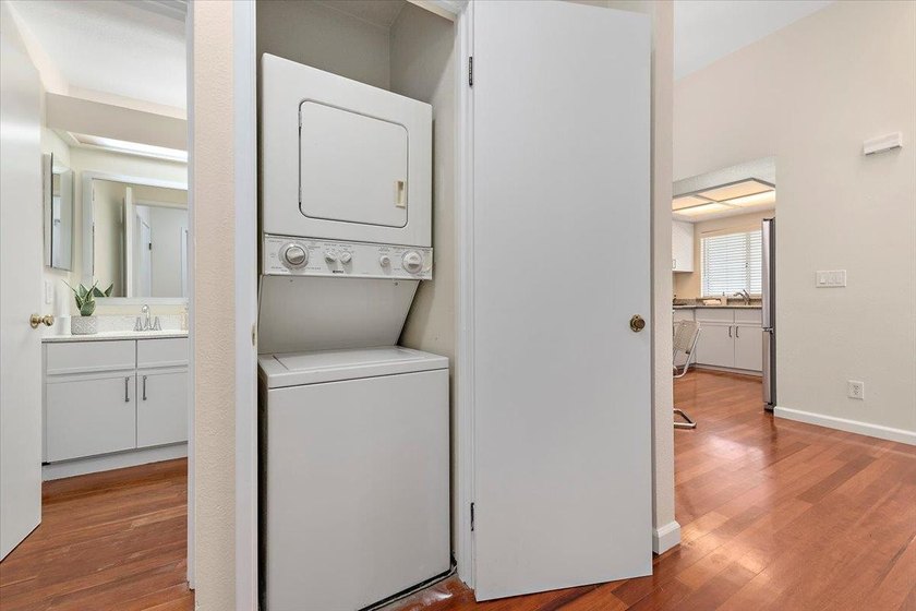Indulge in the serenity of this beautifully updated top-floor - photo 16