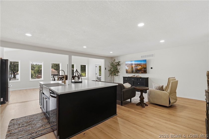 Lakefront living on 2 private acres at the 8MM near Laurie! - photo 7