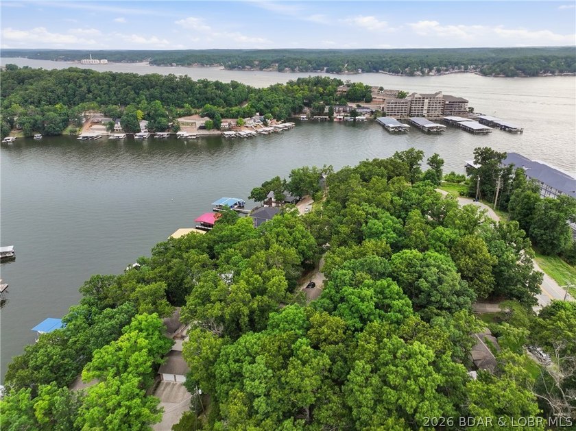 Experience the charm of lakeside living in this beautifully - photo 6