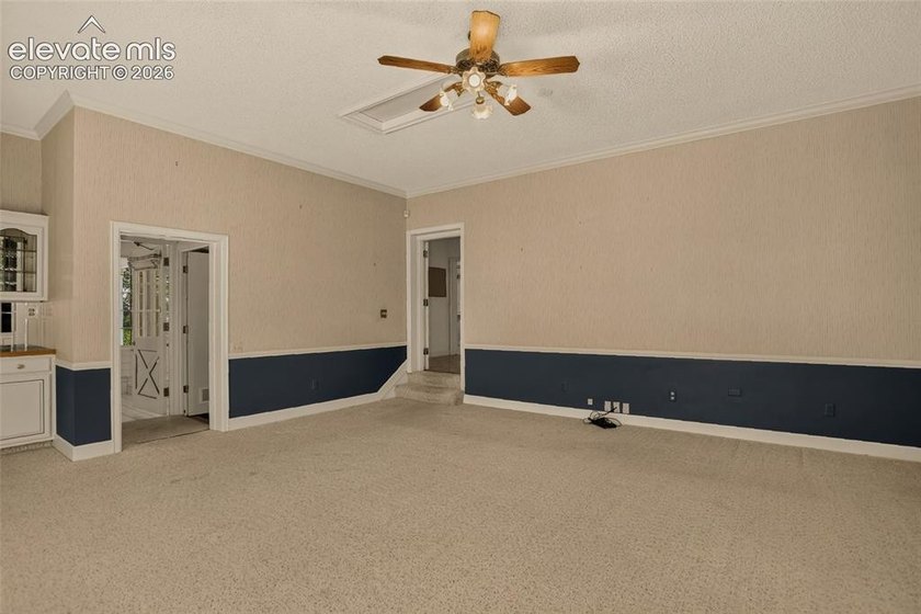 Lovingly preserved and timeless 1954 brick Colonial ranch on a - photo 34