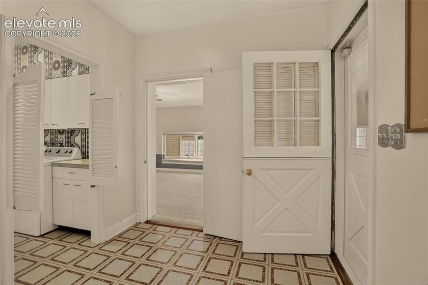 Lovingly preserved and timeless 1954 brick Colonial ranch on a - photo 35
