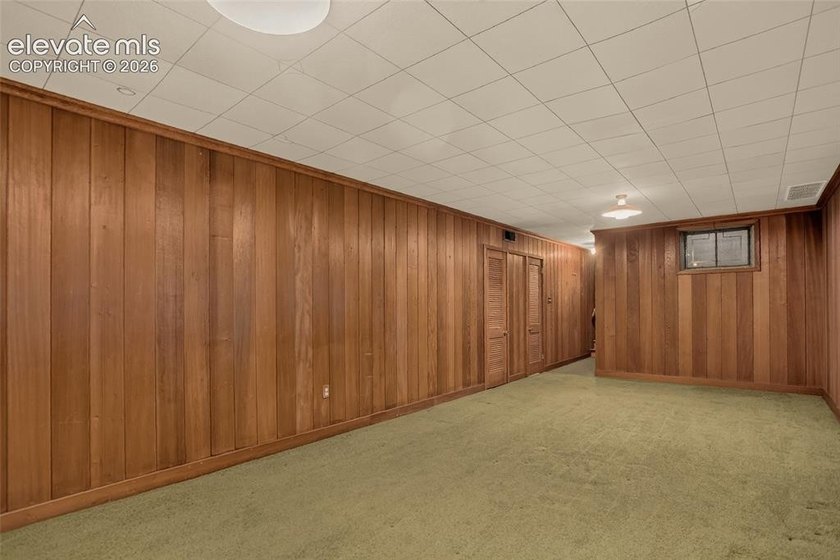 Lovingly preserved and timeless 1954 brick Colonial ranch on a - photo 39