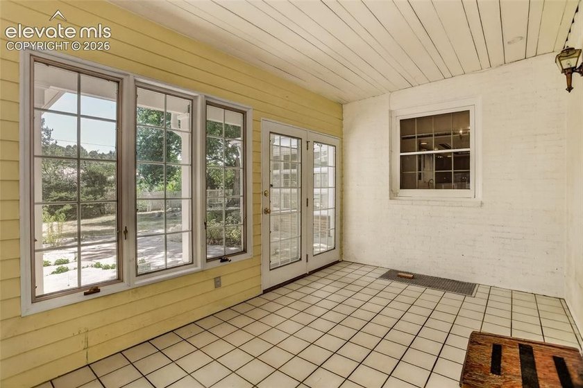 Lovingly preserved and timeless 1954 brick Colonial ranch on a - photo 42