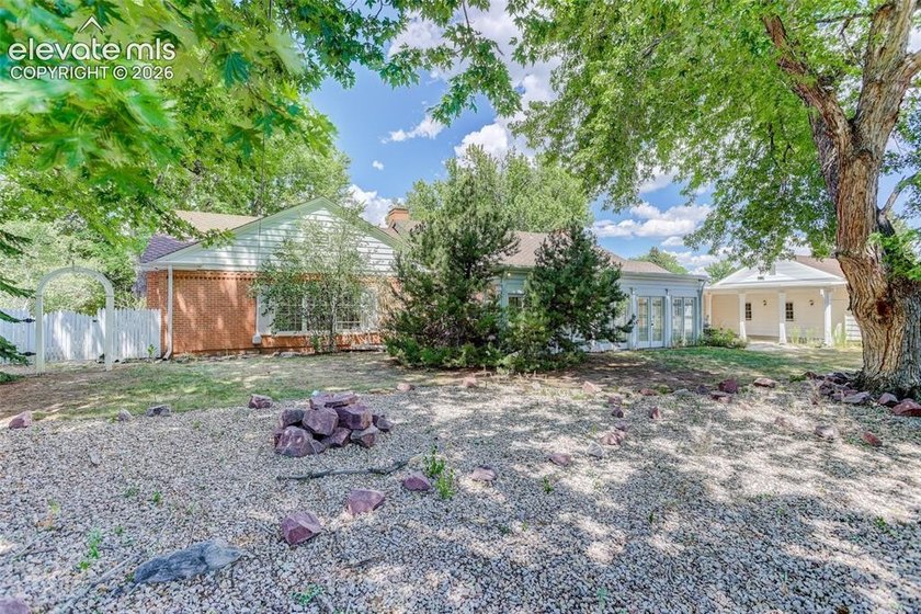 Lovingly preserved and timeless 1954 brick Colonial ranch on a - photo 47