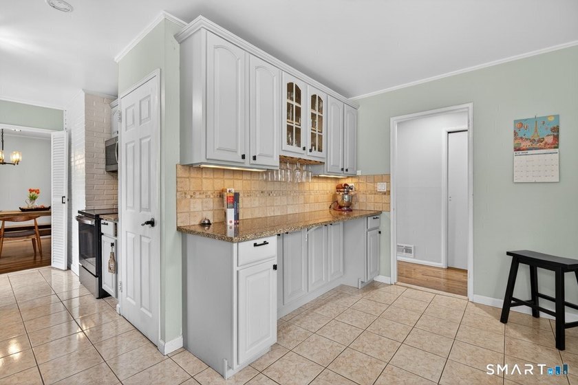 Mid-Ridges at its finest! This beautifully updated home sits on - photo 2