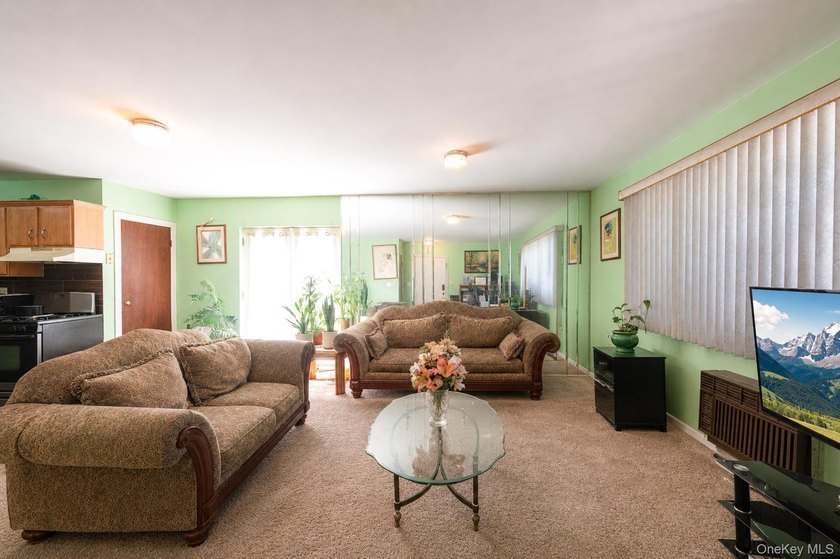 Rare opportunity to own an end-unit, ground-floor condo with a - photo 11