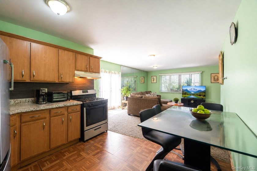Rare opportunity to own an end-unit, ground-floor condo with a - photo 15