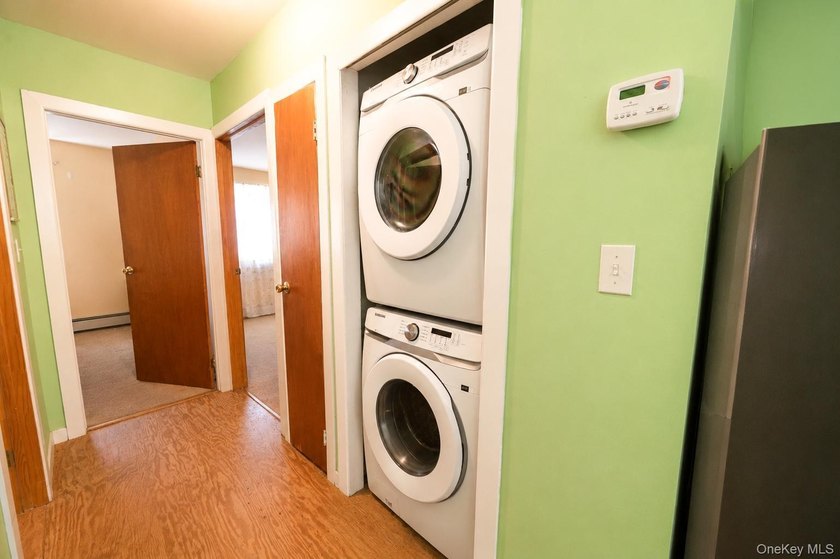 Rare opportunity to own an end-unit, ground-floor condo with a - photo 17
