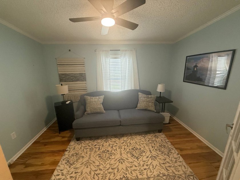 This beautiful home is being sold furnished. It is a 2-bedroom - photo 22