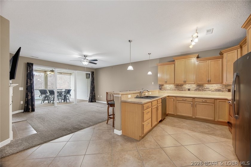 Experience carefree lake living at Sunset Palms, one of Lake of - photo 4