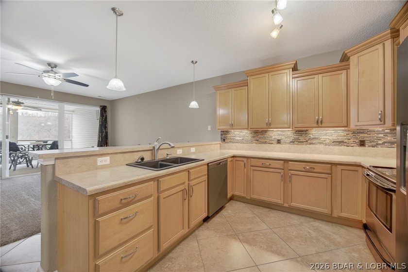 Experience carefree lake living at Sunset Palms, one of Lake of - photo 5