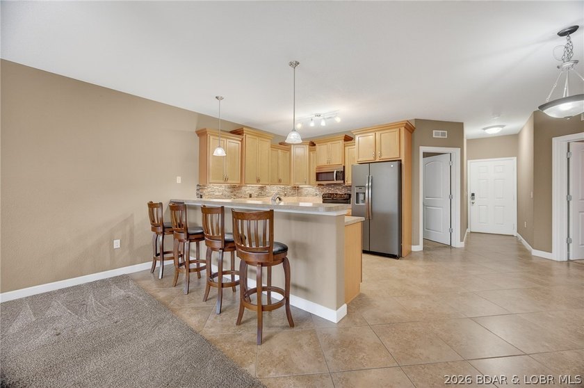 Experience carefree lake living at Sunset Palms, one of Lake of - photo 7
