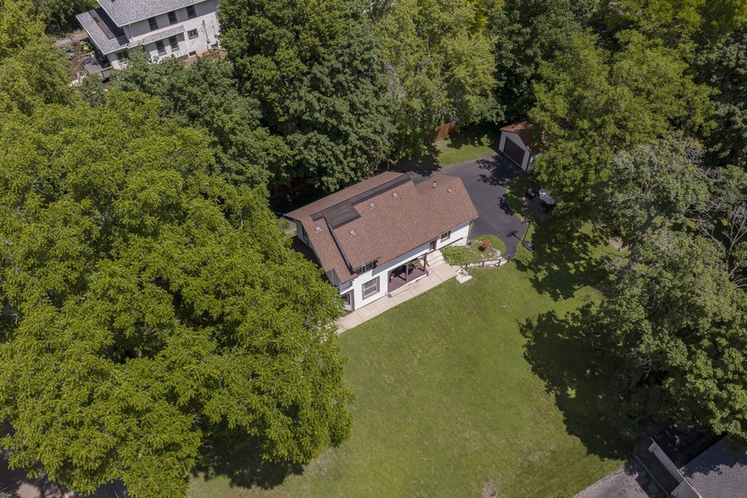This stunning home is located on a hill overlooking Pewaukee - photo 12