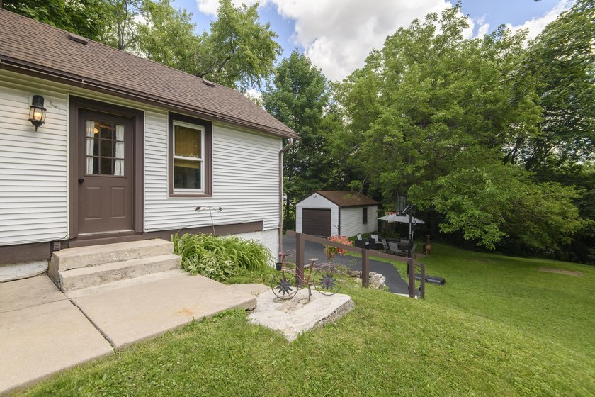 This stunning home is located on a hill overlooking Pewaukee - photo 15