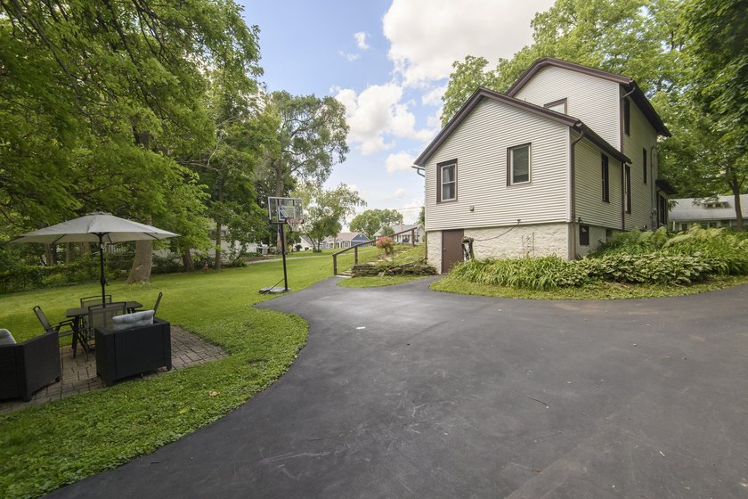 This stunning home is located on a hill overlooking Pewaukee - photo 16