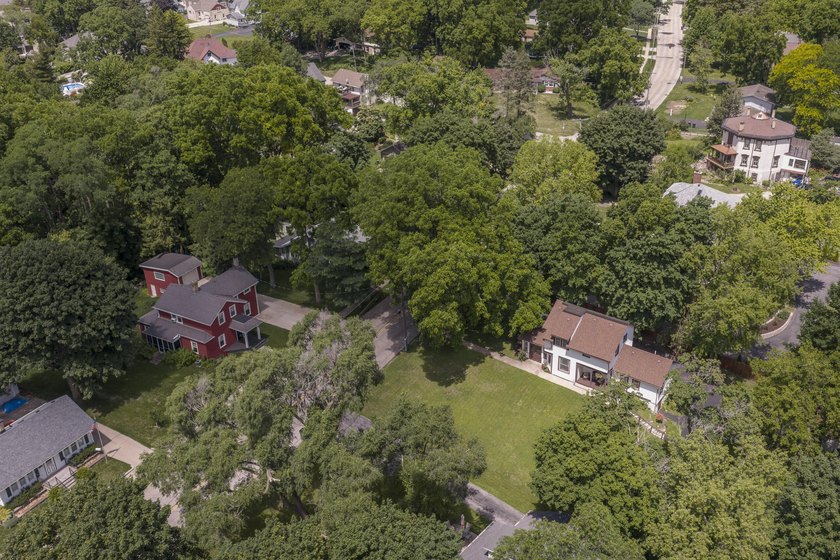 This stunning home is located on a hill overlooking Pewaukee - photo 19