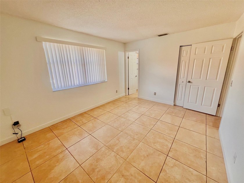 Vacant. all tile , granite countertop, 2 parking spaces - photo 29