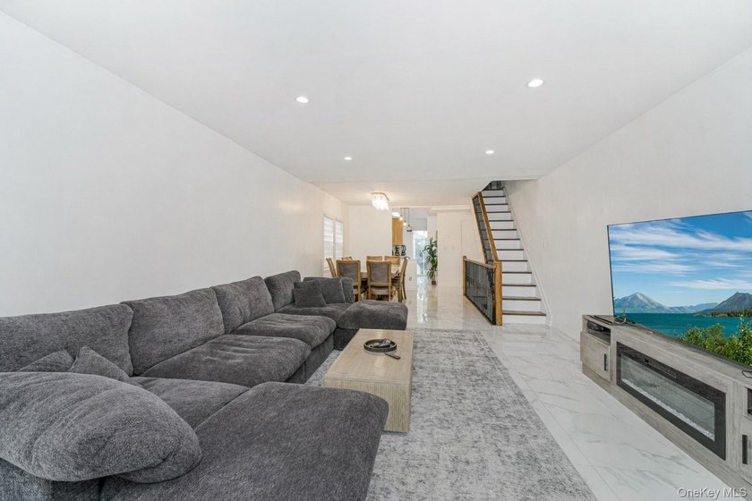 Welcome to this elegant single-family residence nestled in the - photo 3