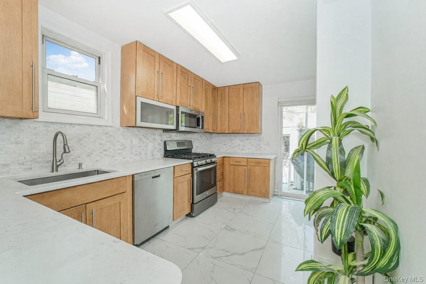 Welcome to this elegant single-family residence nestled in the - photo 6
