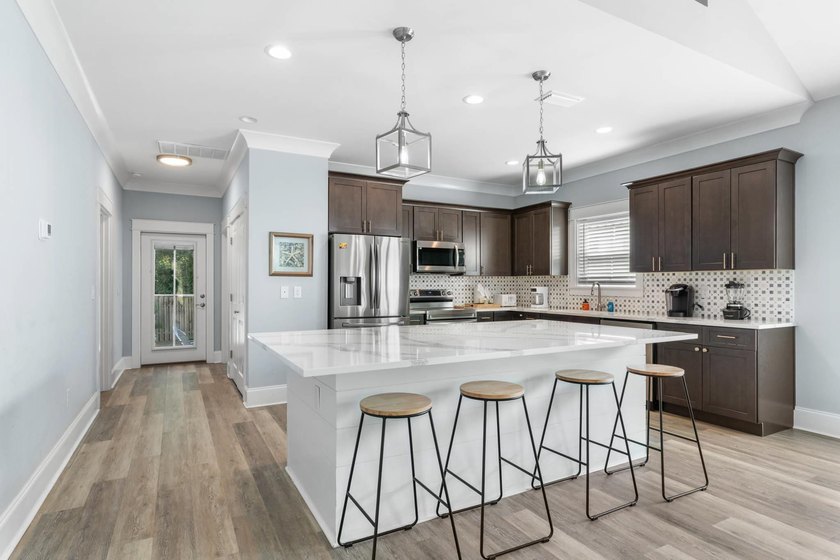 Experience quintessential coastal living in South Walton with - photo 10