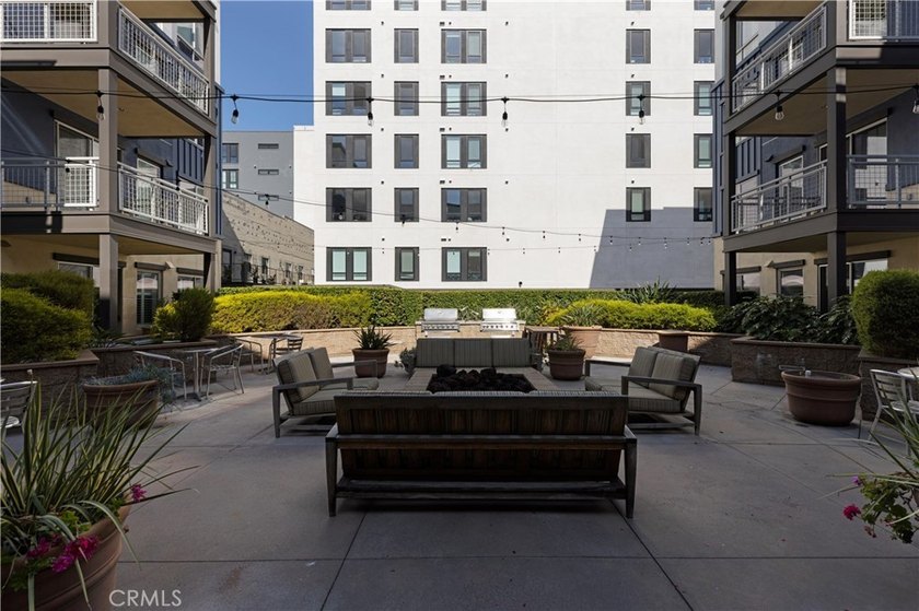 Welcome to 150 The Promenade N #202, a fully renovated - photo 29