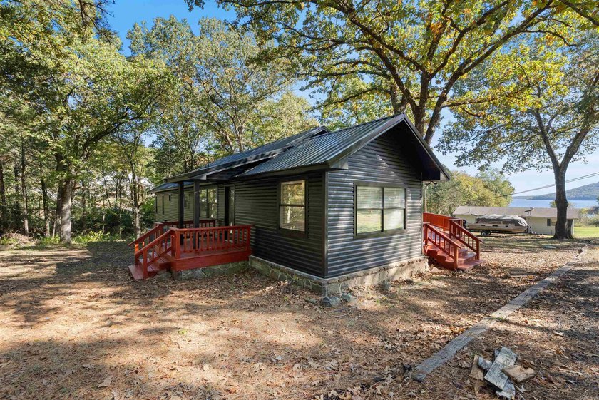 Great location near marina on Greers Ferry lake...1.3 acres with - photo 30