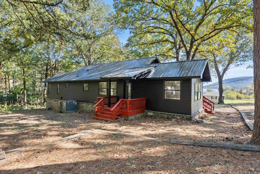 Great location near marina on Greers Ferry lake...1.3 acres with - photo 31