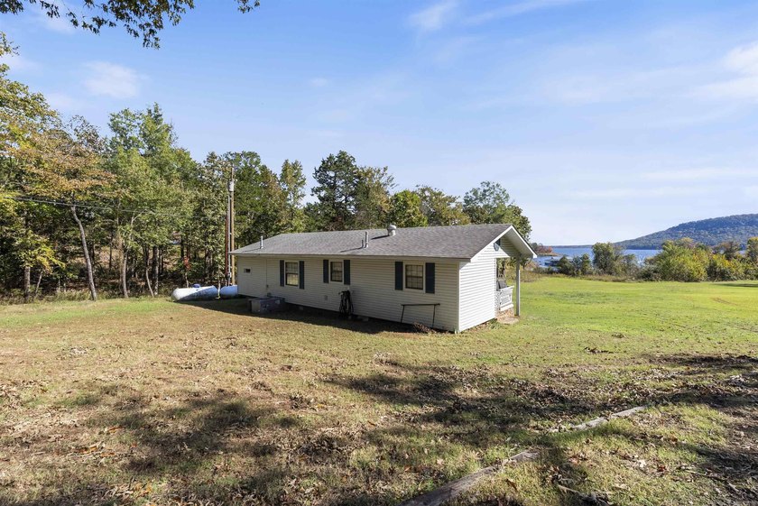 Great location near marina on Greers Ferry lake...1.3 acres with - photo 33