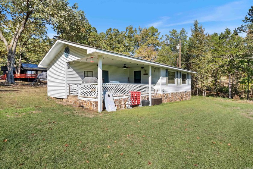 Great location near marina on Greers Ferry lake...1.3 acres with - photo 34