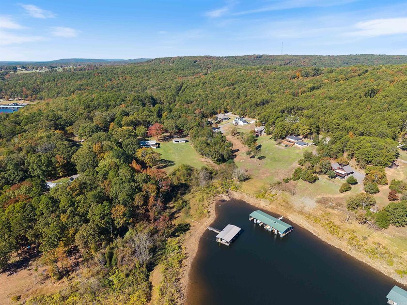 Great location near marina on Greers Ferry lake...1.3 acres with - photo 50