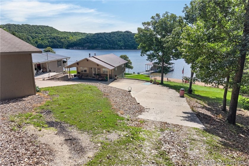 Lakefront living on the desirable 53 Mile Marker! Nestled in the - photo 6