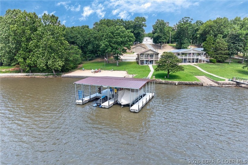 Lakefront living on the desirable 53 Mile Marker! Nestled in the - photo 9