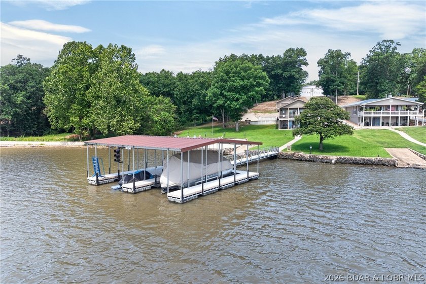 Lakefront living on the desirable 53 Mile Marker! Nestled in the - photo 10