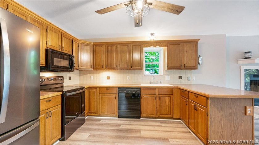 Move-in ready home offering an unbeatable location by both land - photo 6