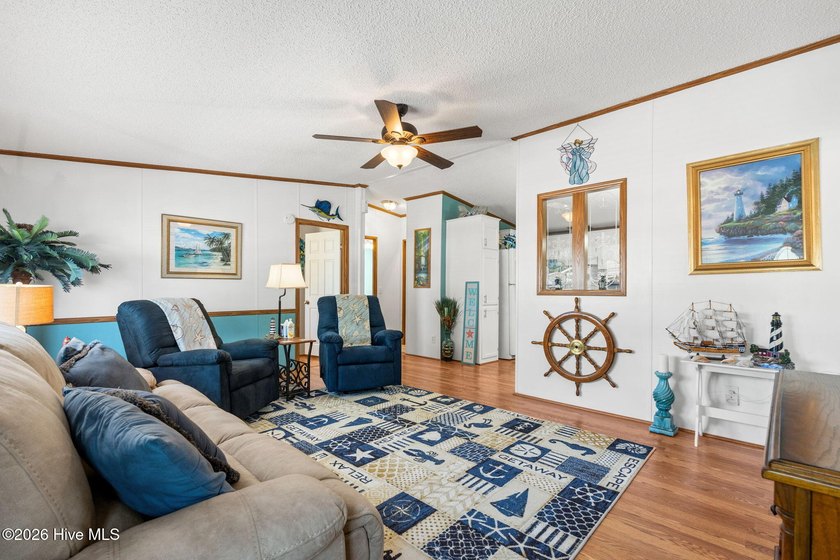 Enjoy coastal living just minutes from the sandy shores of - photo 7