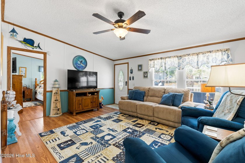 Enjoy coastal living just minutes from the sandy shores of - photo 8