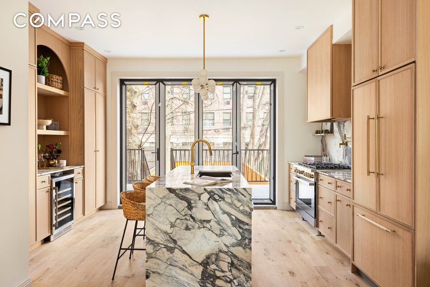 Originally built in 1899, this fully renovated single-family - photo 4