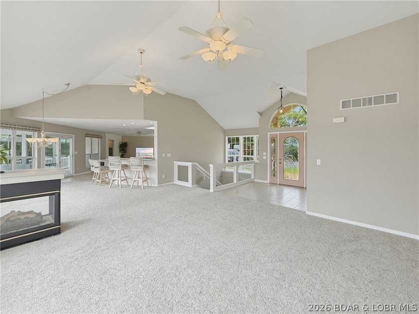 Perched on a bluff in the heart of Osage Beach, this one-owner - photo 3