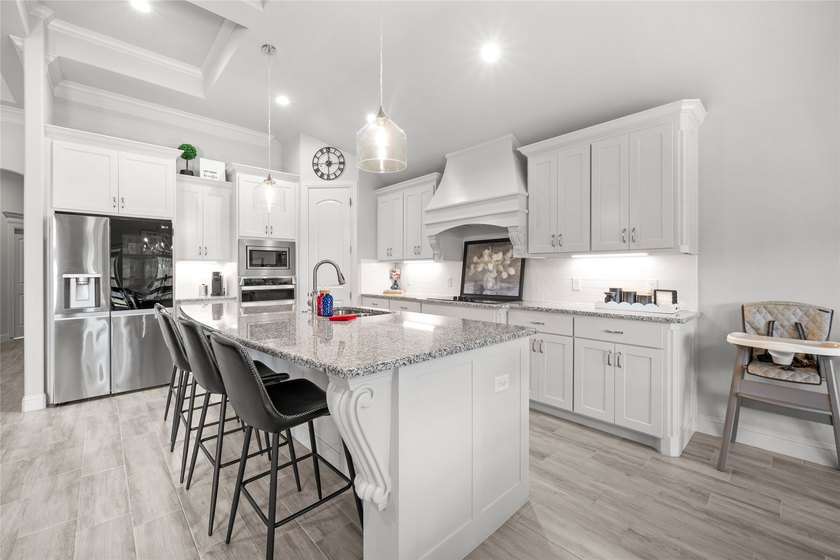This beautifully designed home offers a blend of modern - photo 11