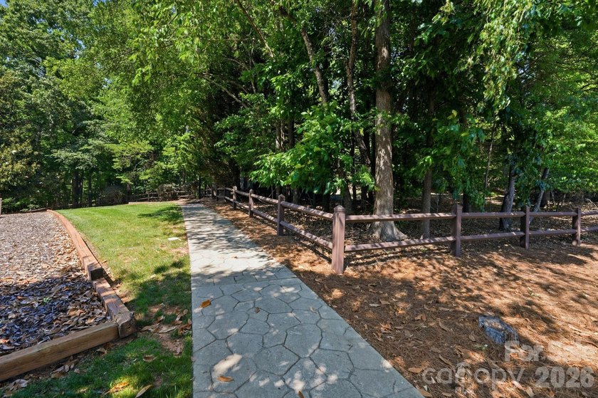 Welcome to a landmark Lake Wylie waterfront estate offering an - photo 8