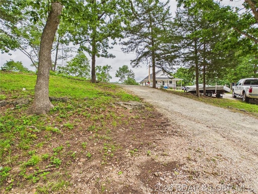 Don't miss this exceptional 4-bedroom, 2-bath lakefront home - photo 2