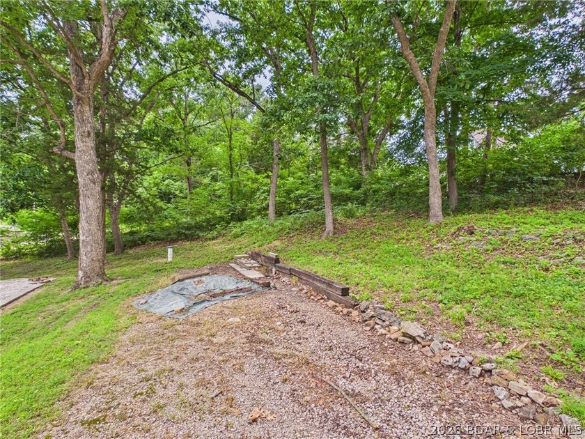 Don't miss this exceptional 4-bedroom, 2-bath lakefront home - photo 3