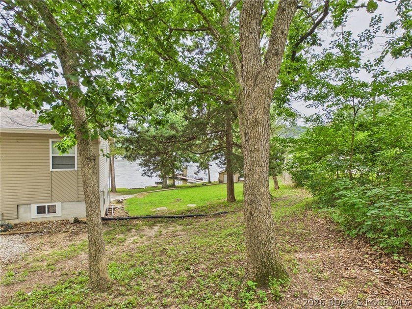 Don't miss this exceptional 4-bedroom, 2-bath lakefront home - photo 6
