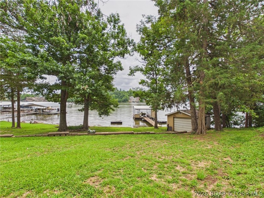 Don't miss this exceptional 4-bedroom, 2-bath lakefront home - photo 7
