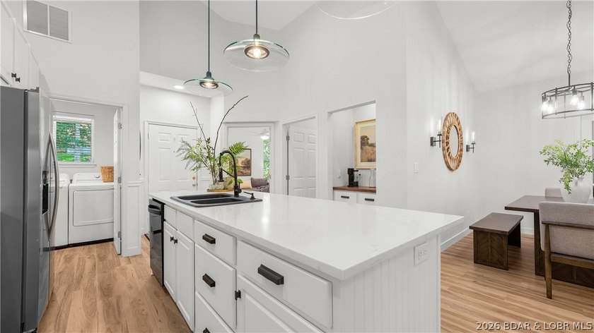 Completely remodeled, fully furnished, and truly turnkey, this - photo 4