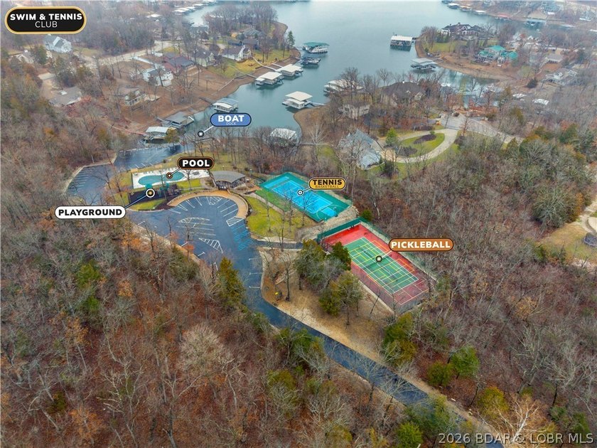 1.62-acre wooded lot in the sought-after Four Seasons community - photo 9